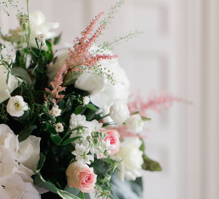 Pastel bouquet complete with green foliage 