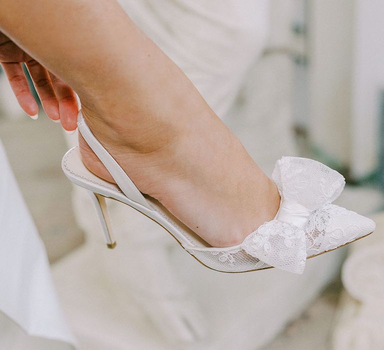 Stiletto slingback wedding shoes with sheer lace and bow