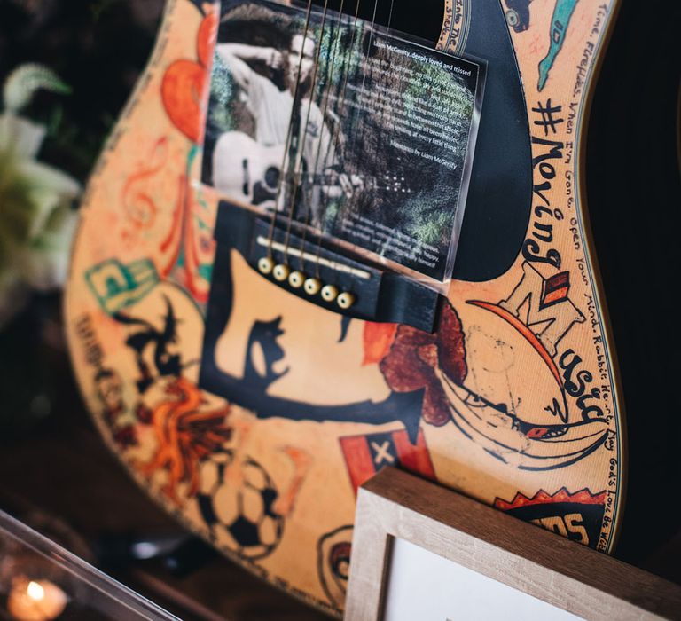 Kate's brother Liam's guitar with personal note honouring his memory 