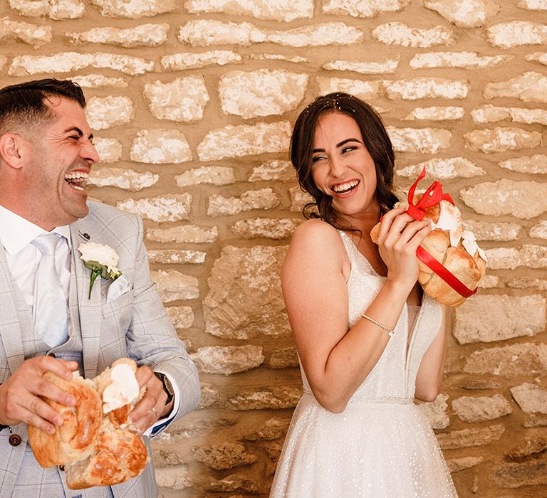 Bulgarian wedding traditions at Caswell House wedding reception with breaking the bread tradition 