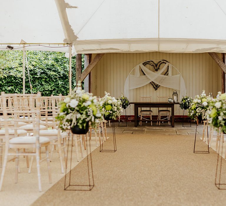 Marquee wedding ceremony at Houchins wedding venue 