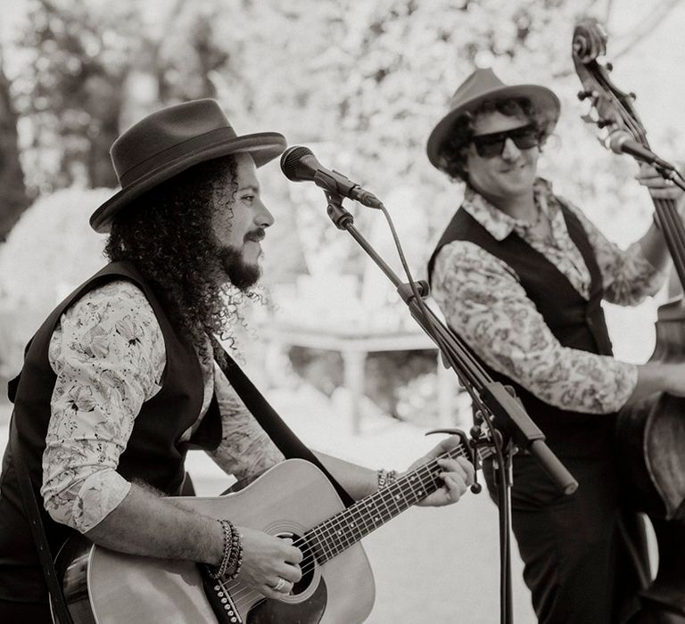 Wedding band performs at outdoor wedding celebrations 