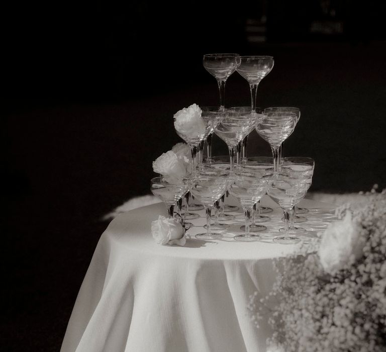 Champagne tower decoration for luxe dinner party wedding 