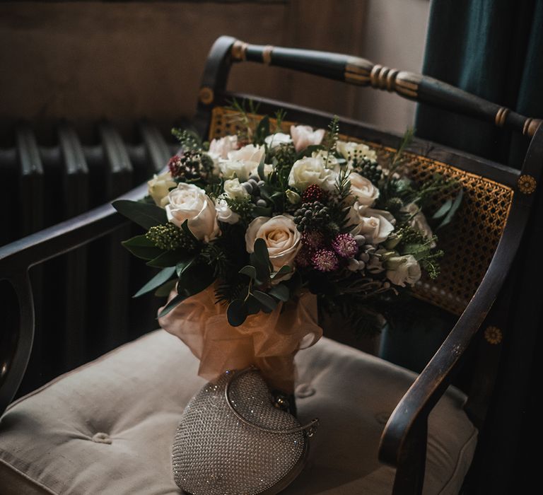 White rose wedding bouquet tied with ribbon 