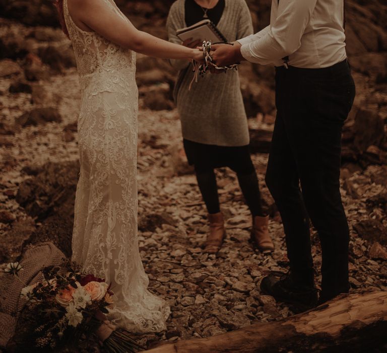 Bride and groom exchanging vows at intimate elopement