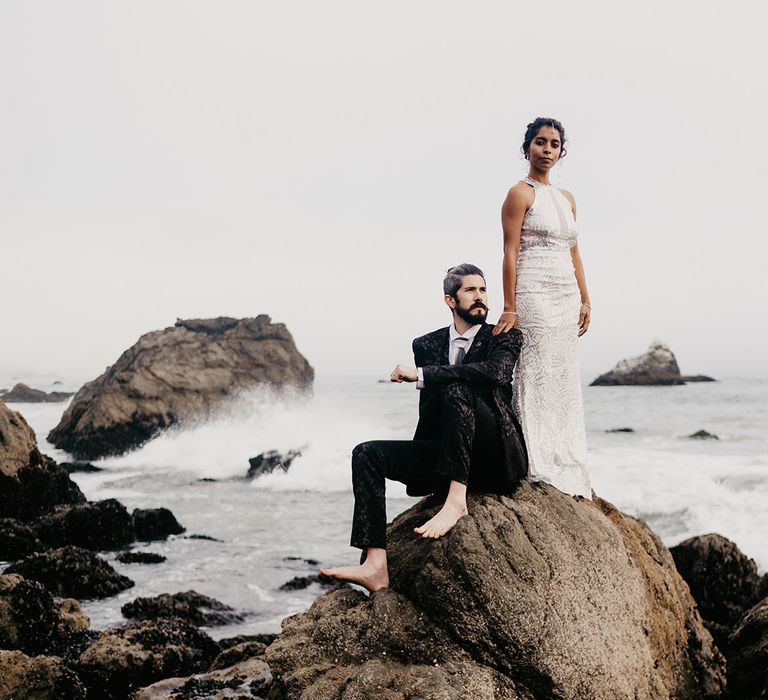 Bride and groom coastal portrait by Liv With The Lens 