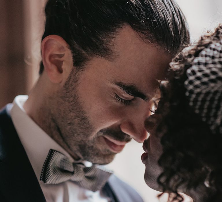 Bride & groom look lovingly at one another after wedding ceremony