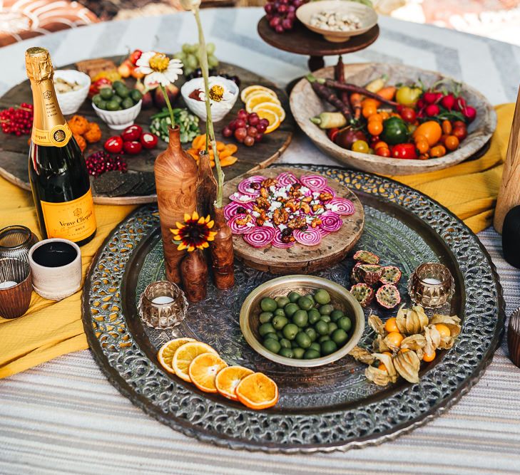 Colourful grazing table platter, complete with olives and vegetables 