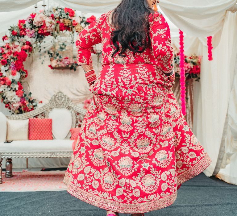 Bride shows off her bridal trainers on the day of her wedding