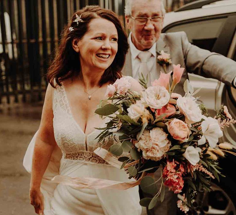 Bride in Rembo Styling wedding dress and Tilly Thomas Lux hairpiece