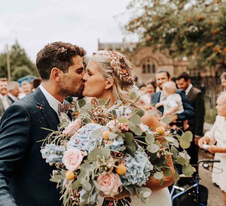 Pastel bouquet for bride at church wedding