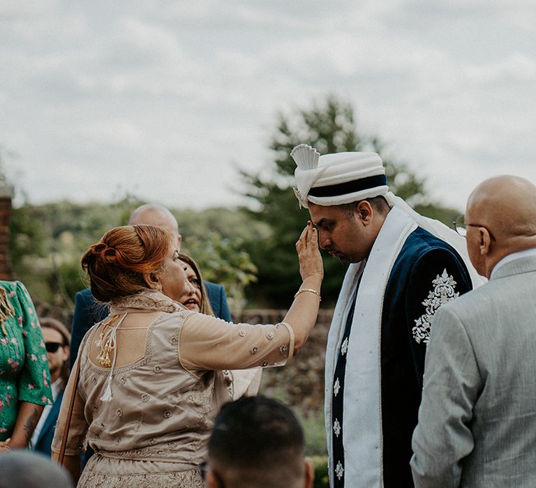 Multicultural wedding ceremony at the Lillibrooke Manor And Barns