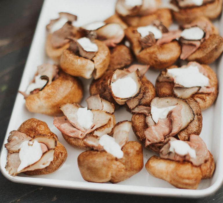 Yorkshire pudding filled snacks for the wedding guests to enjoy 