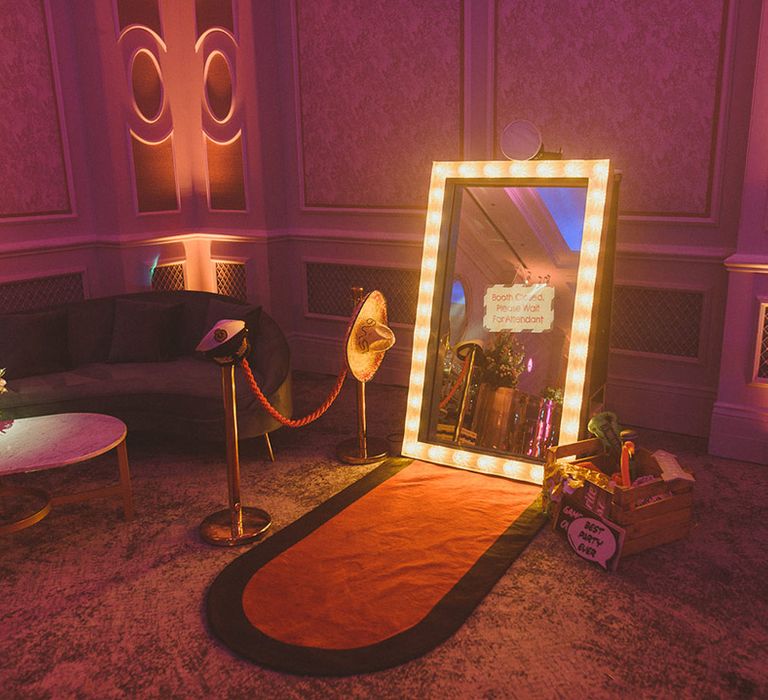 Light up mirror photo booth with fun and decorative props for the wedding day 