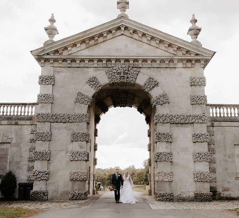 Bake Barn wedding with the bride and groom walking around together for their classic and traditional style wedding 