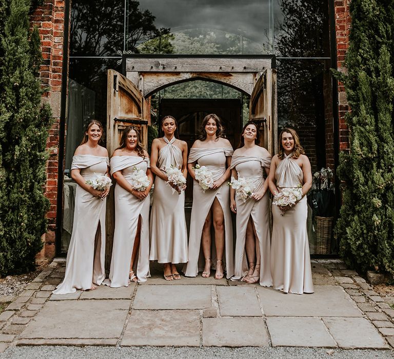 Neutral bridesmaid dresses for neutral wedding theme at Shustoke Barns in Warwickshire 