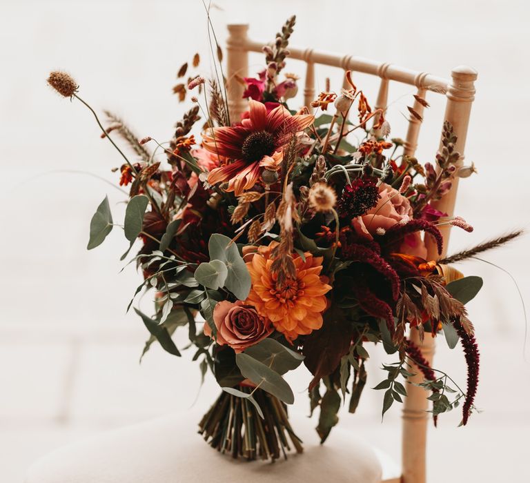 Autumn wedding bouquet with orange wedding flowers