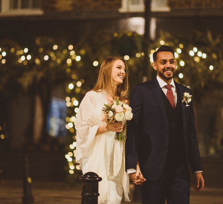 Stunning bride and groom at Christmas wedding in Chelsea, London