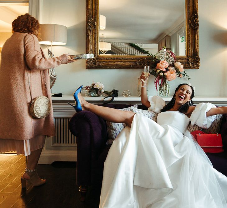 Bride in blue Manolo Blahnik shoes 