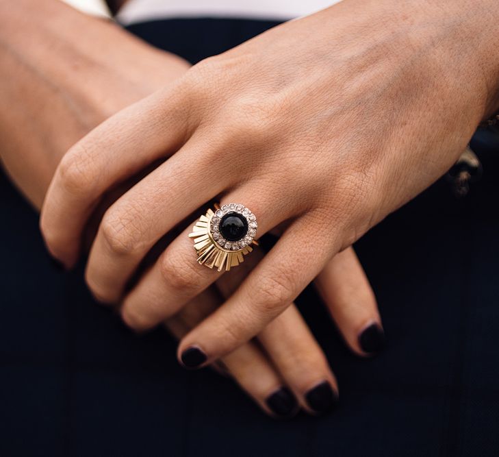 Bride wears dark coloured stone in engagement band | Samuel Docker Photography