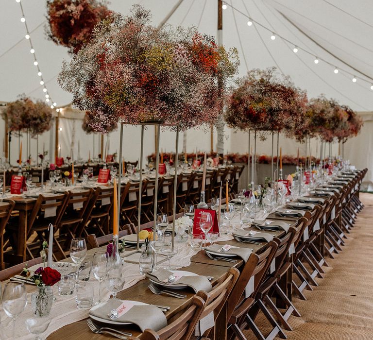 colourful tall centrepiece wedding flowers and gypsophila flower clouds and installations 