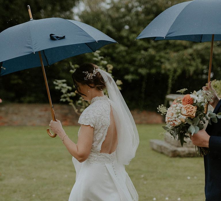 Rosa Clara wedding dress with lace detail and open back