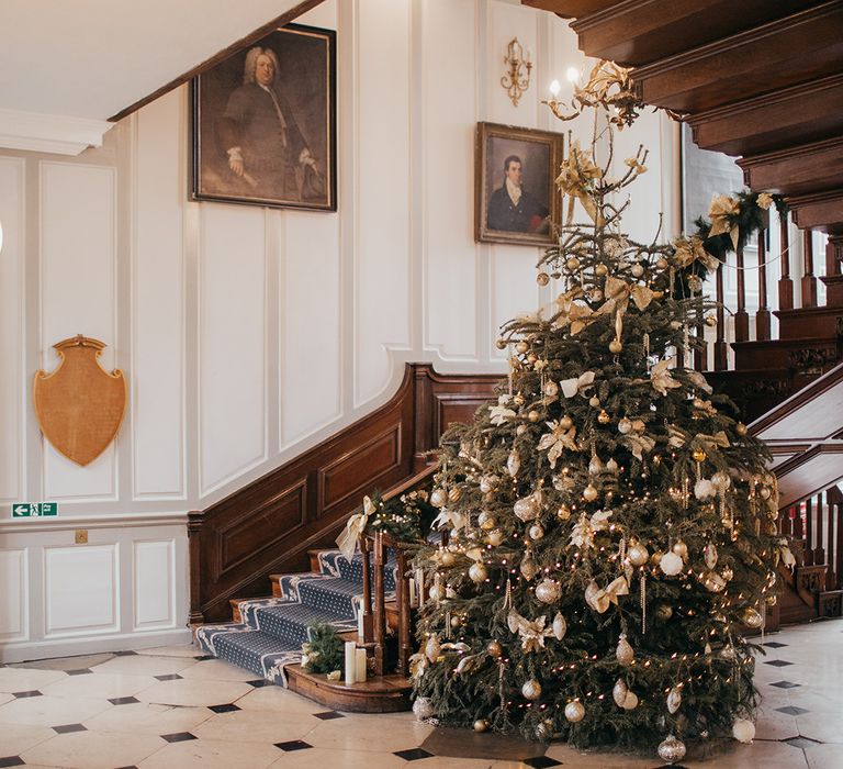 Christmas tree complete with gold decor 