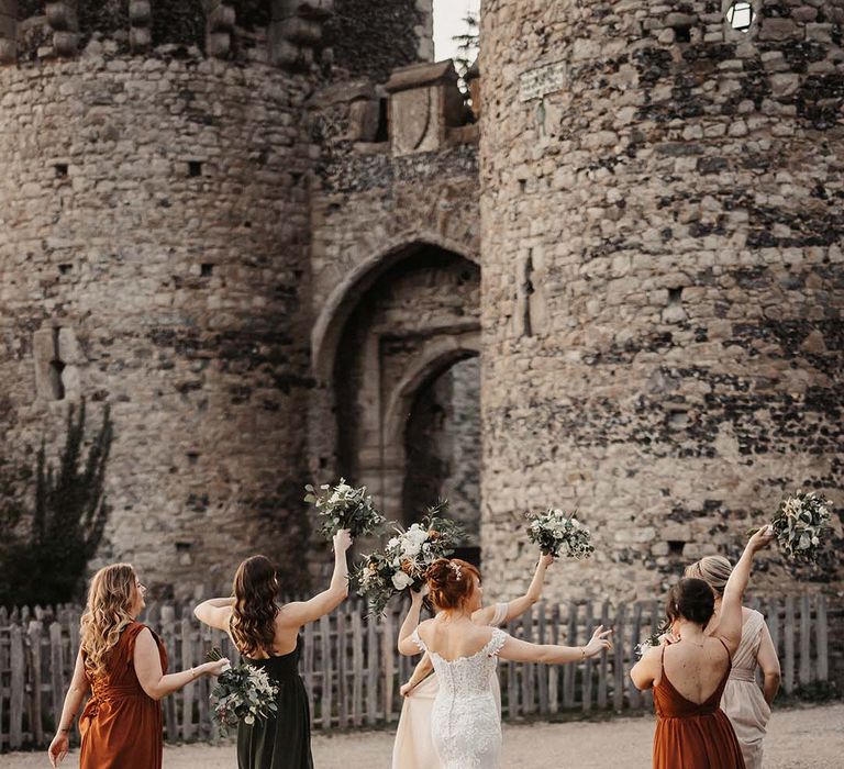 Brides and bridesmaids rock up to the Cooling Castle Barn wedding venue