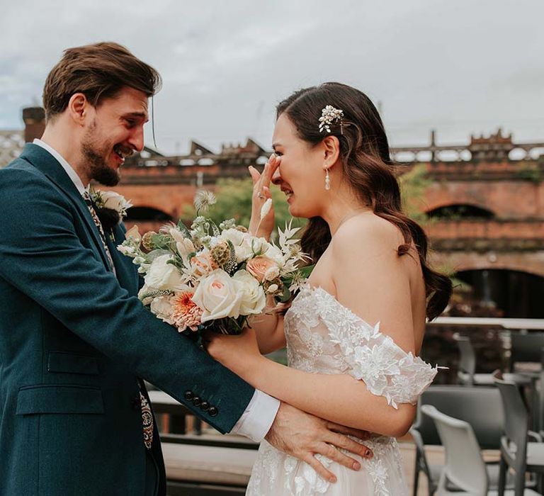 Bride and groom shed tears for each other as they both get their 'first look' at each other!