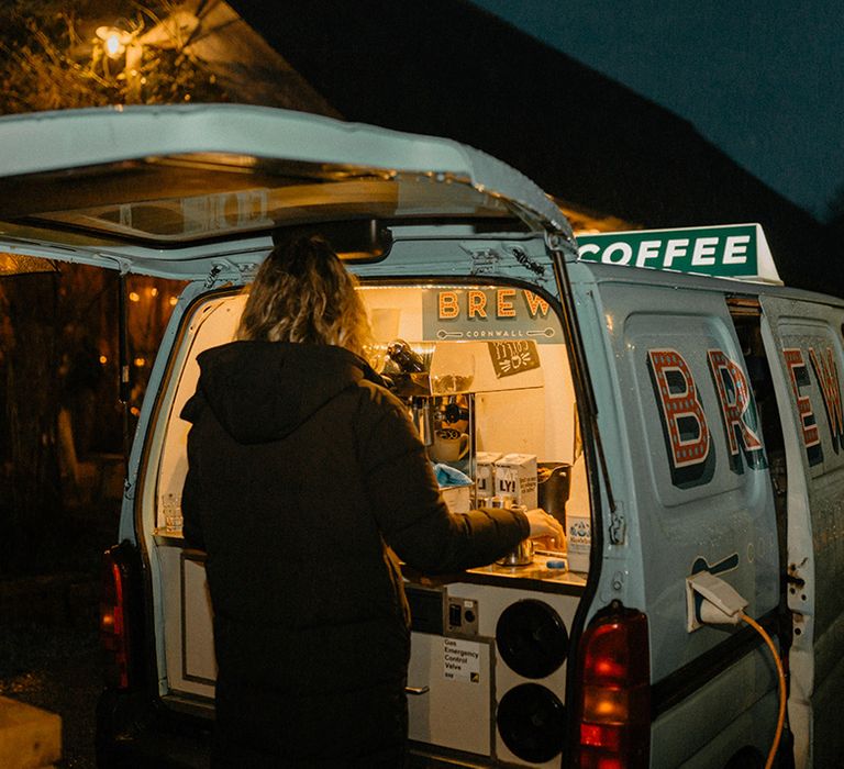 Outdoor drinks reception with coffee van for guest refreshment 