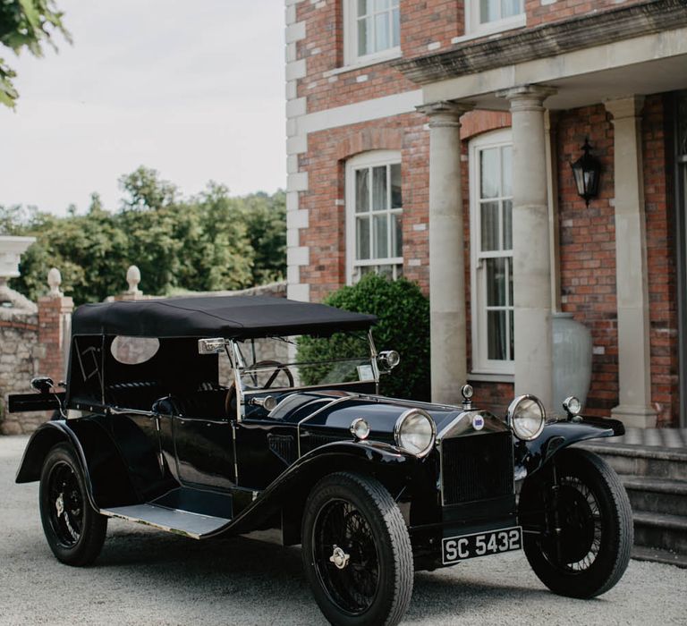 Black vintage Lancia Lamba wedding car