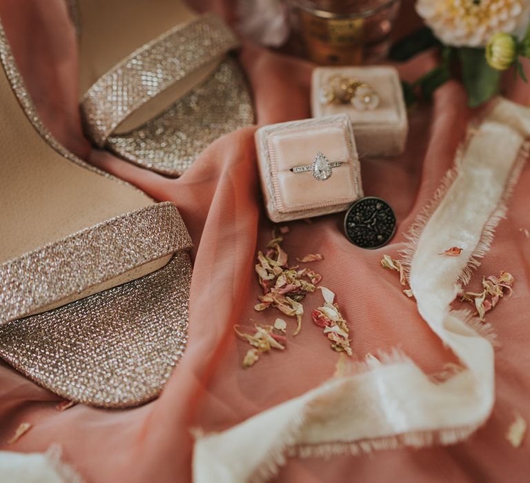 Bridal accessories with sparkly shoes, dried petal confetti, pear shaped engagement ring and more 