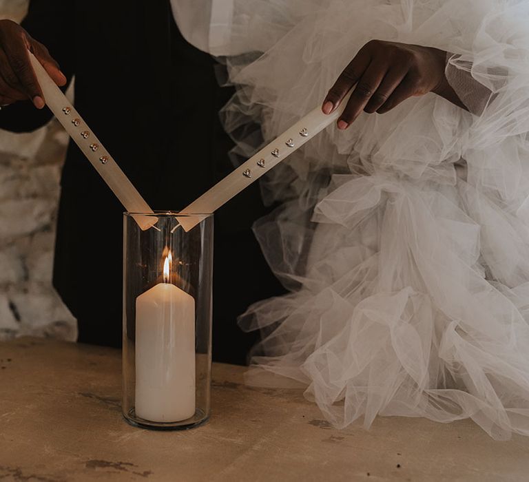 Shared candle lighting ceremony for wedding at Norfolk wedding venue 