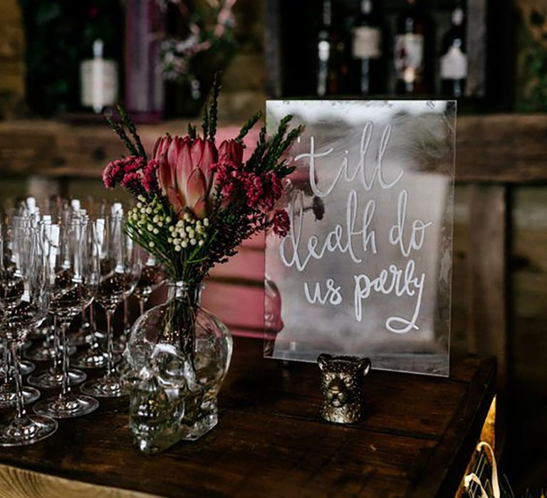 Sign reading: "Till Death Do Us Party" at wedding by Epic Love Story Photography