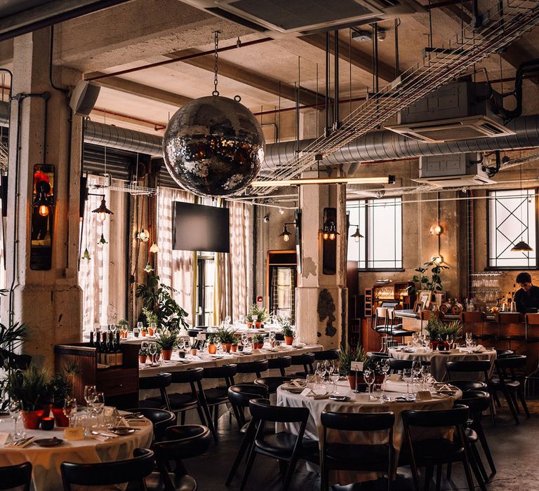 Gordon Ramsay's Bread Street Kitchen wedding venue with large disco ball 