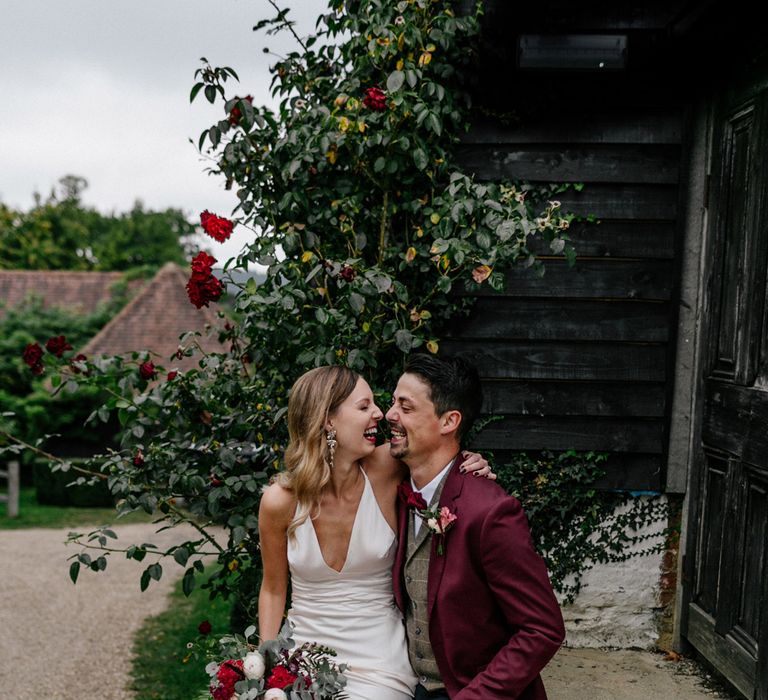 Stylish bride and groom at micro wedding