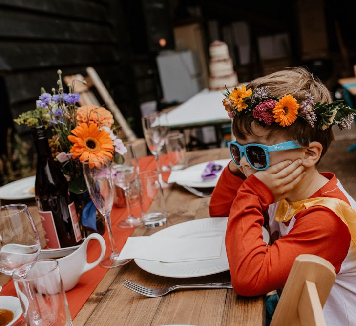 page boys and flower girls in colourful outfits 