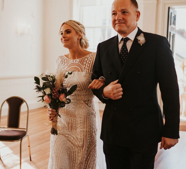 Father of the bride walking his daughter down the aisle at Micro wedding 