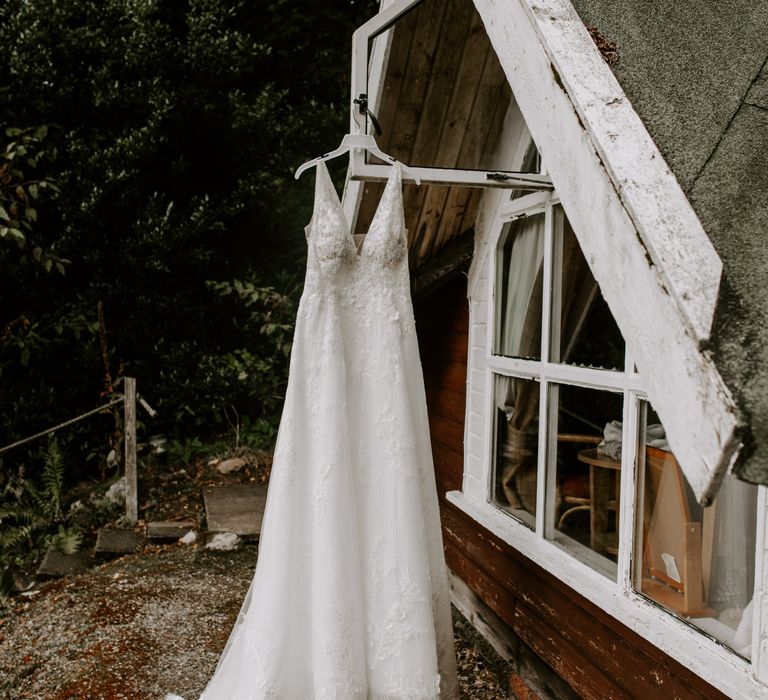 Sparkly white floral wedding dress in the Scottish Highlands