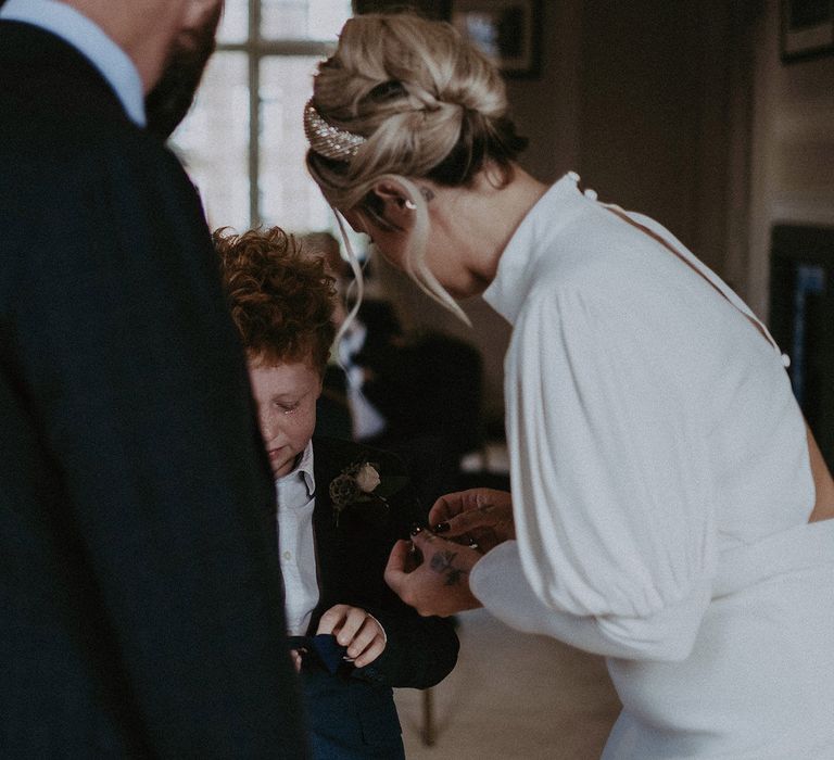 The bride and grooms son as the ring bearer 