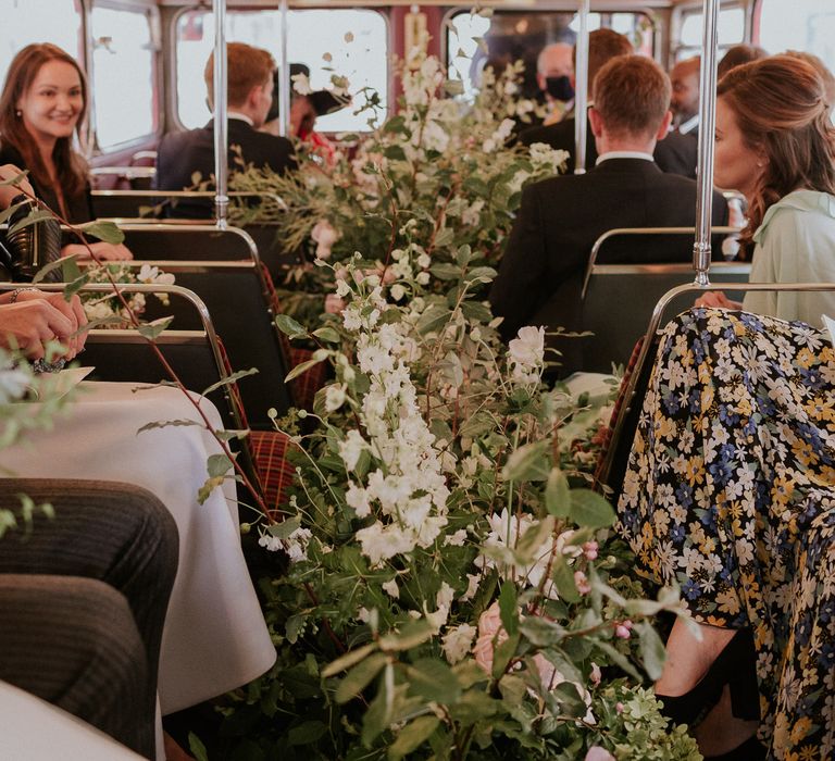 London bus wedding transport with flower installation 