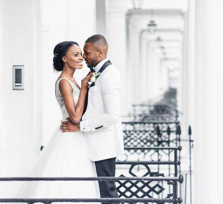 Bride & groom embrace during photoshoot