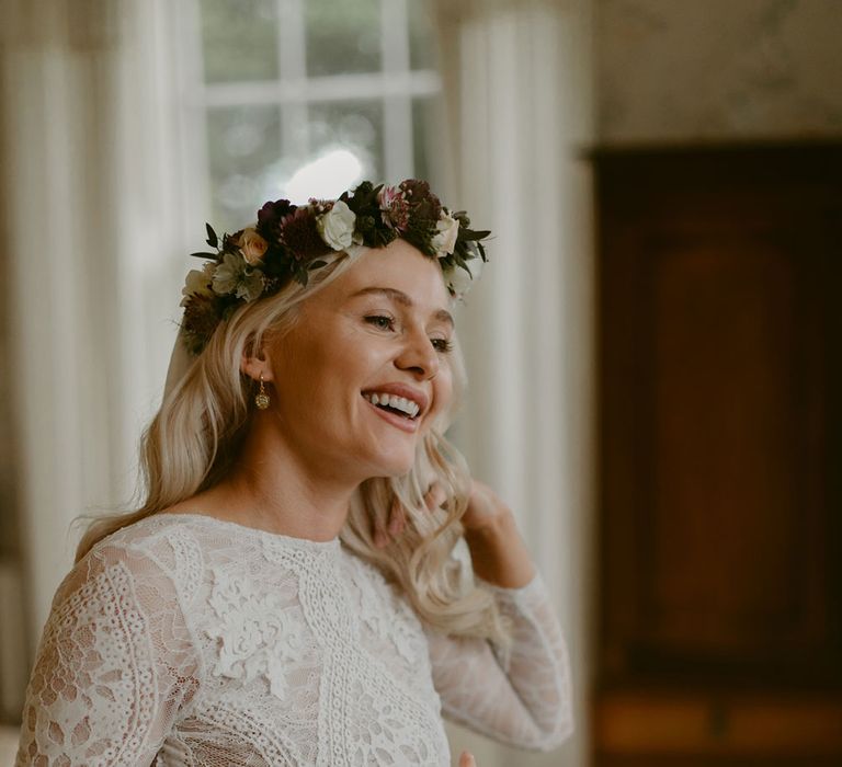 Smiling bride in Grace Loves Lace Wedding Dress, single tier cathedral length veil and flower crown at Drenagh Estate wedding