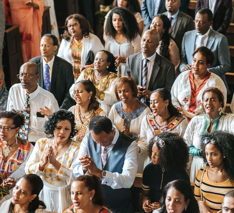 Ethiopian wedding guests in traditional outfits 