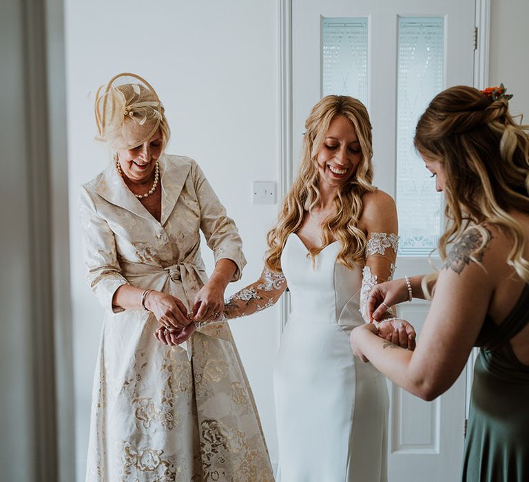 Bride has custom sleeves added to her bridal gown