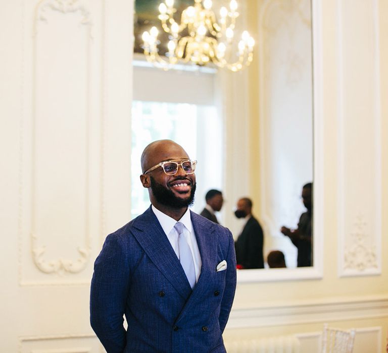 Groom smiles on his wedding day