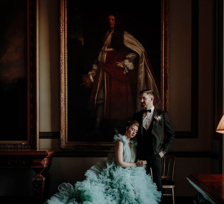 Bride in a ruffle light blue wedding dress at Newburgh Priory