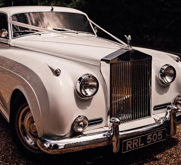 Classic white wedding car transportation 