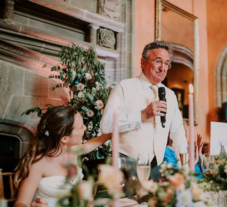 Father of the bride gives speech during reception 