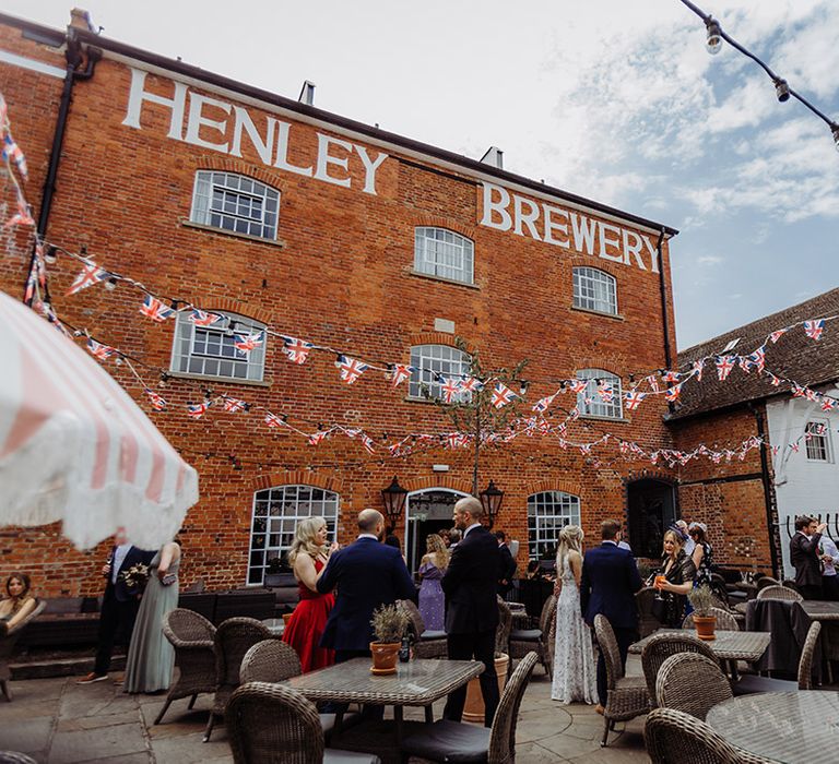 Henley Brewery wedding venue decorated with Union Jack flags